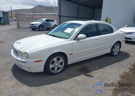 2002 Jaguar X-Type 3.0L из США, поврежденный, VIN SAJEA51C02WC42090